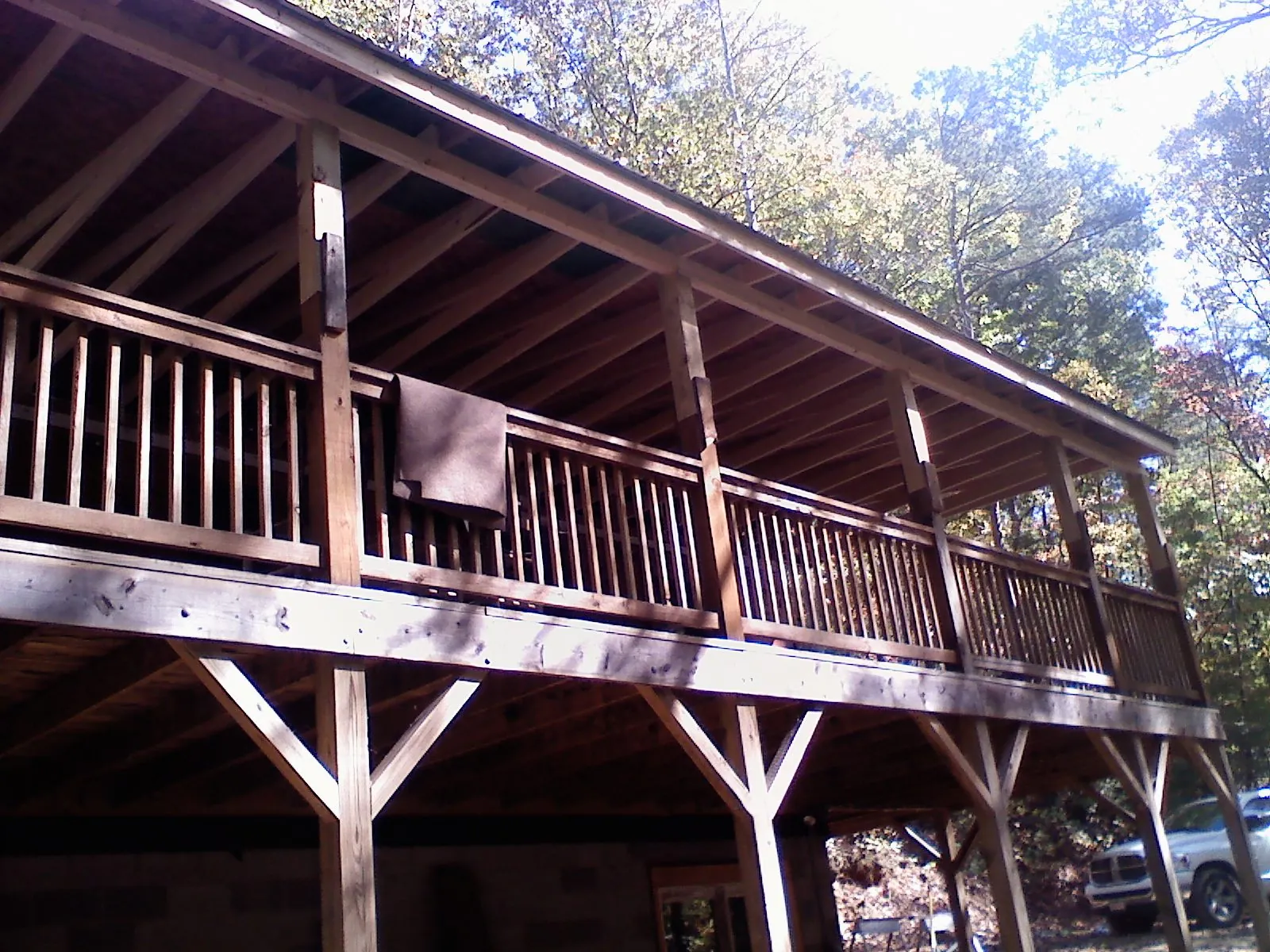 Timber framing under a new elevated porch and deck — Roof Leak Repair in Carmine by Roofing Brothers